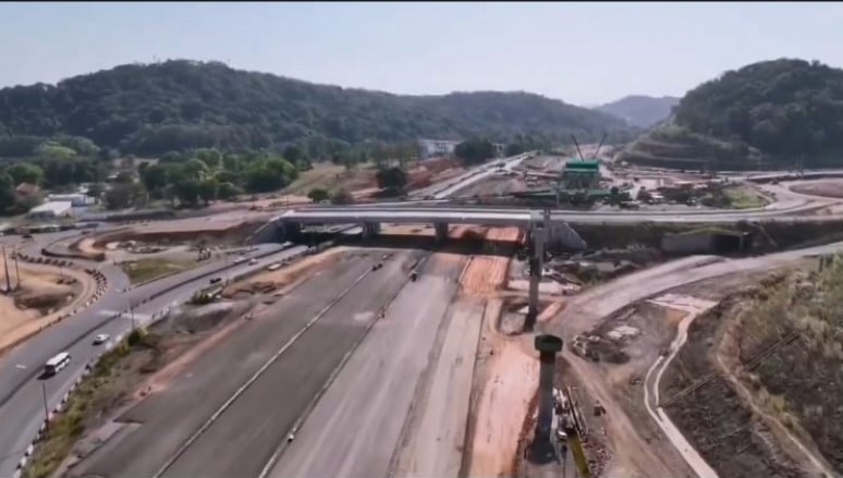 In addition to expanding to eight lanes, the project included construction of three bridges, two highway spans, and five new interchanges.